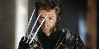 X-Men Wolverine shows off his claws, in the original black suit