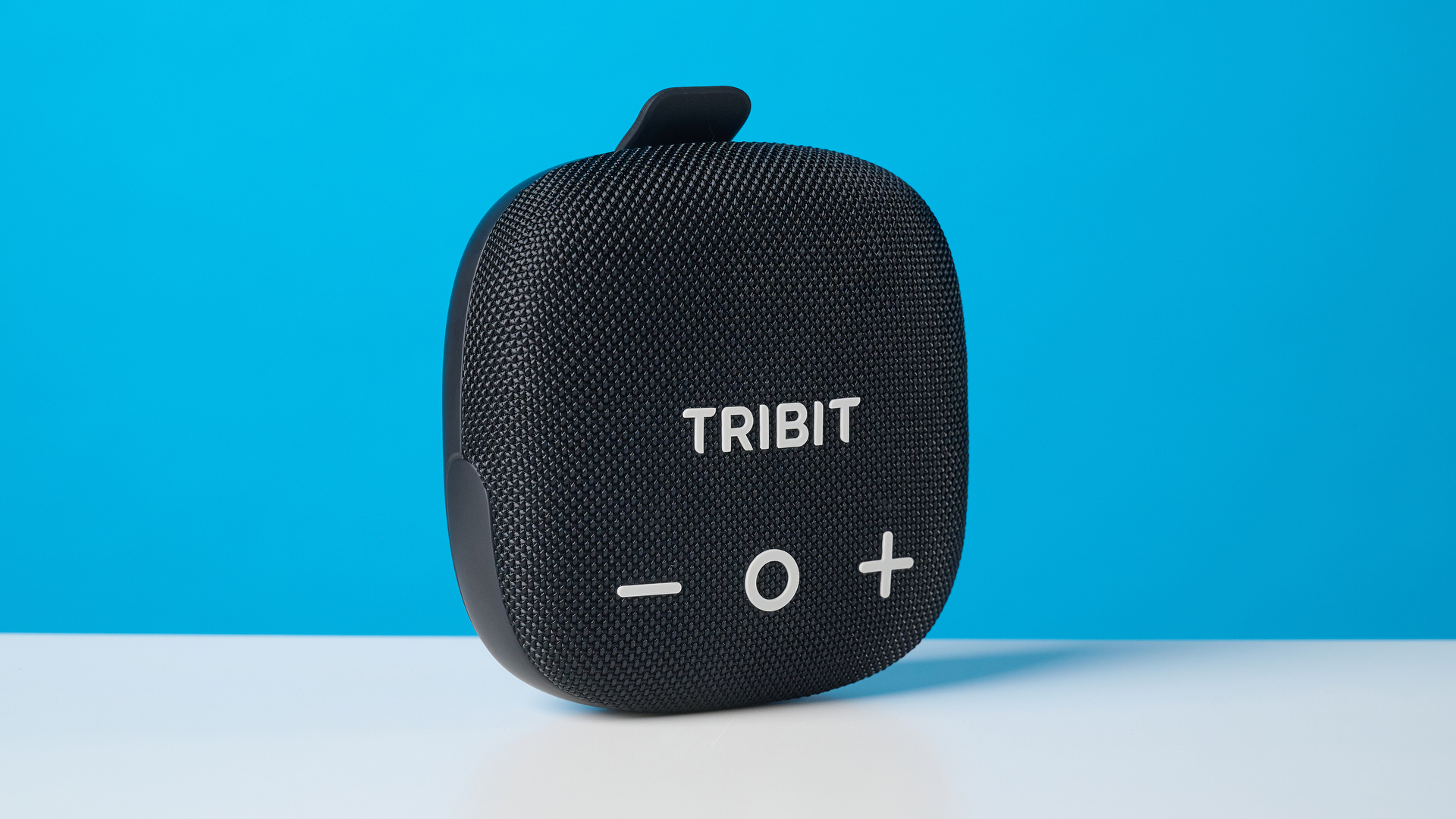 Tribit StormBox Micro 3 in black photographed in front of a blue background