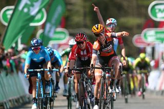 Christine Majerus (obscured, in the red, white and blue jersey) celebrates Boels Dolmans teammate Amy Pieters’ stage win at the 2019 Women’s Tour