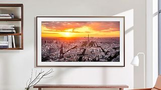 Samsung Frame hanging on wall of designer living room
