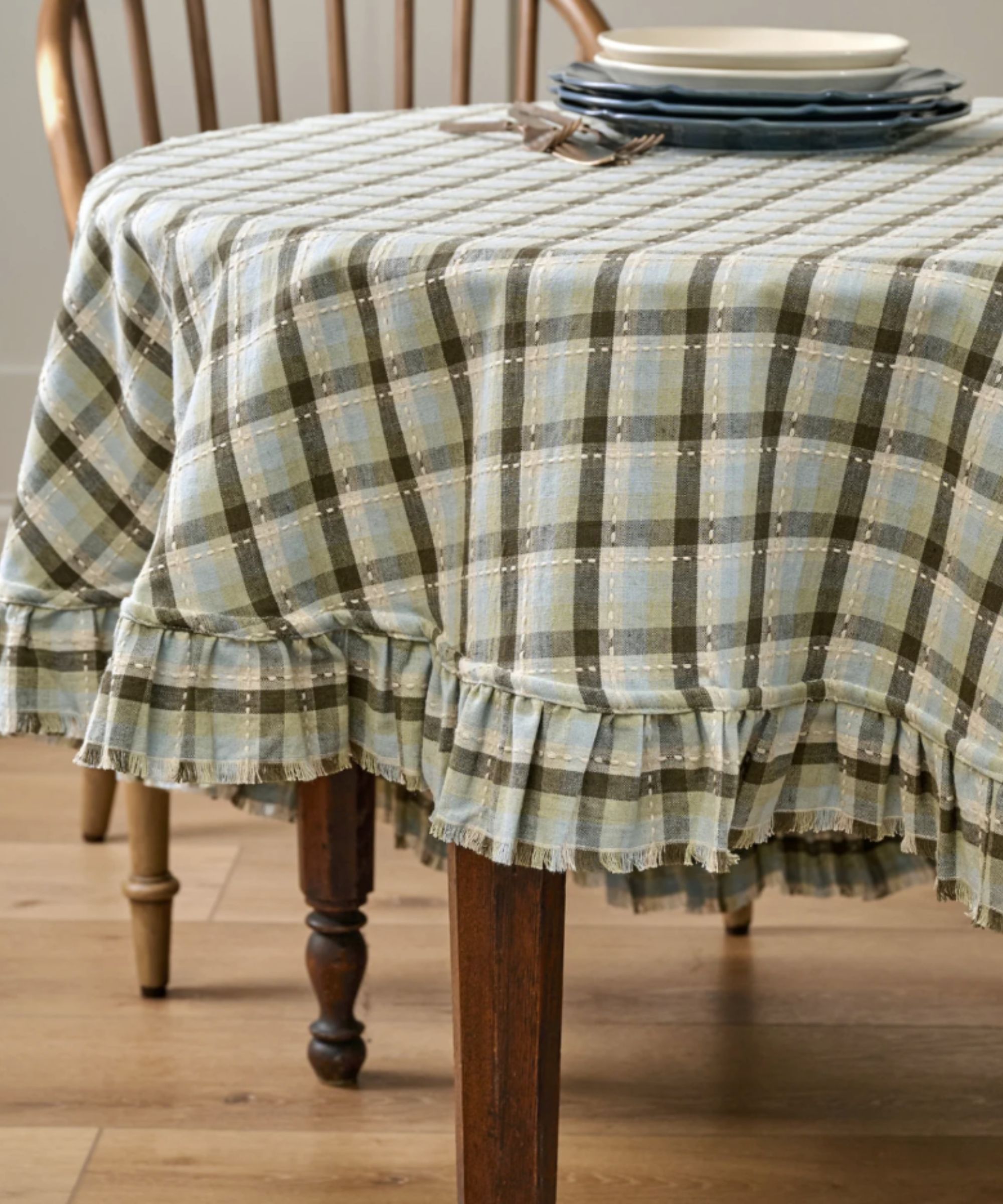 Blue, green and white plaid tablecloth with frill edges