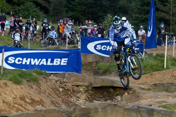 A rider competes in the Afan four cross