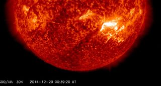 A powerful X1.8-class solar flare erupts from the sun on Dec. 19, 2014 in this view from NASA's Solar Dynamics Observatory spacecraft tracking sun weather.