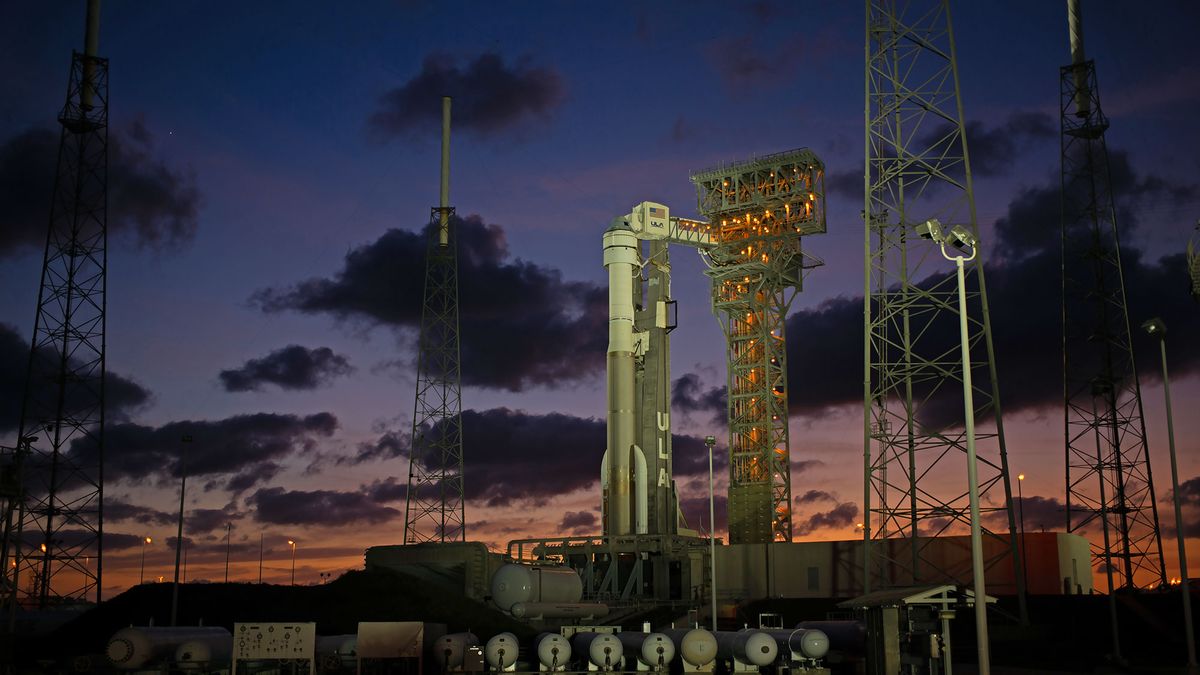 A United Launch Alliance Atlas V rocket with Boeing&rsquo;s CST-100 Starliner spacecraft onboard is seen illuminated by spotlights on the launch pad at Space Launch Complex 41 ahead of the Orbital Flight Test mission, Wednesday, Dec. 18, 2019 at Cape Canaveral Air Force Station in Florida.