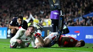 Fraser Dingwall of England scores his team's second try after evading the tackle attempt from Mason Grady of Wales during the Guinness Six Nations 2024 match between England and Wales at Twickenham Stadium on February 10, 2024