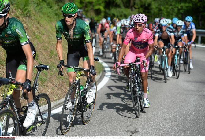 Nairo Quintana (Movistar) sits behind Team Europcar on the climb