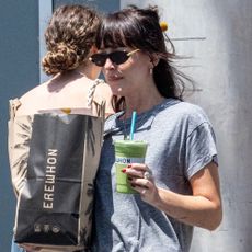 Dakota Johnson wears jeans and Gucci loafers to grab a smoothie and groceries from Erewhon