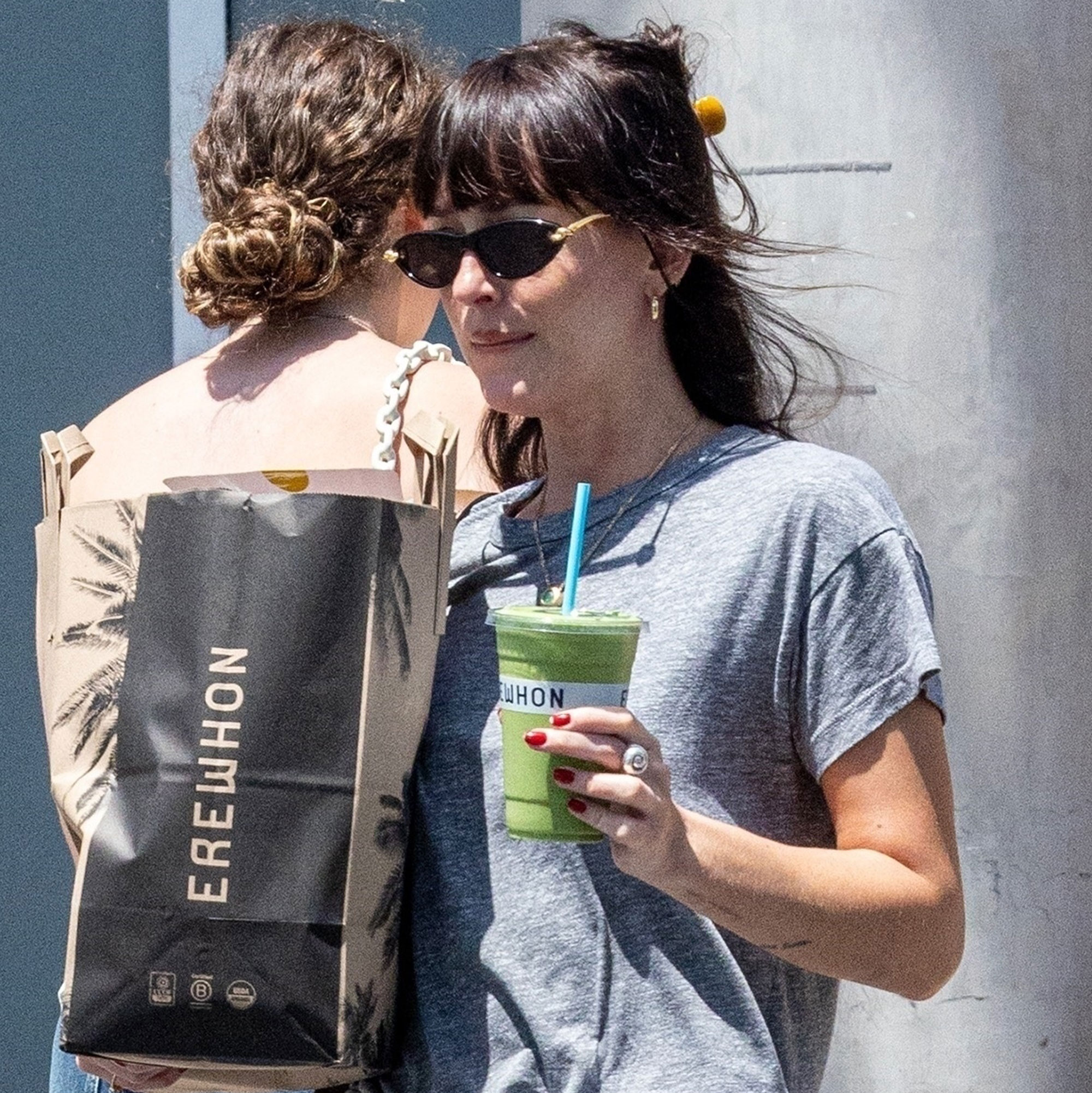 Dakota Johnson wears jeans and Gucci loafers to grab a smoothie and groceries from Erewhon