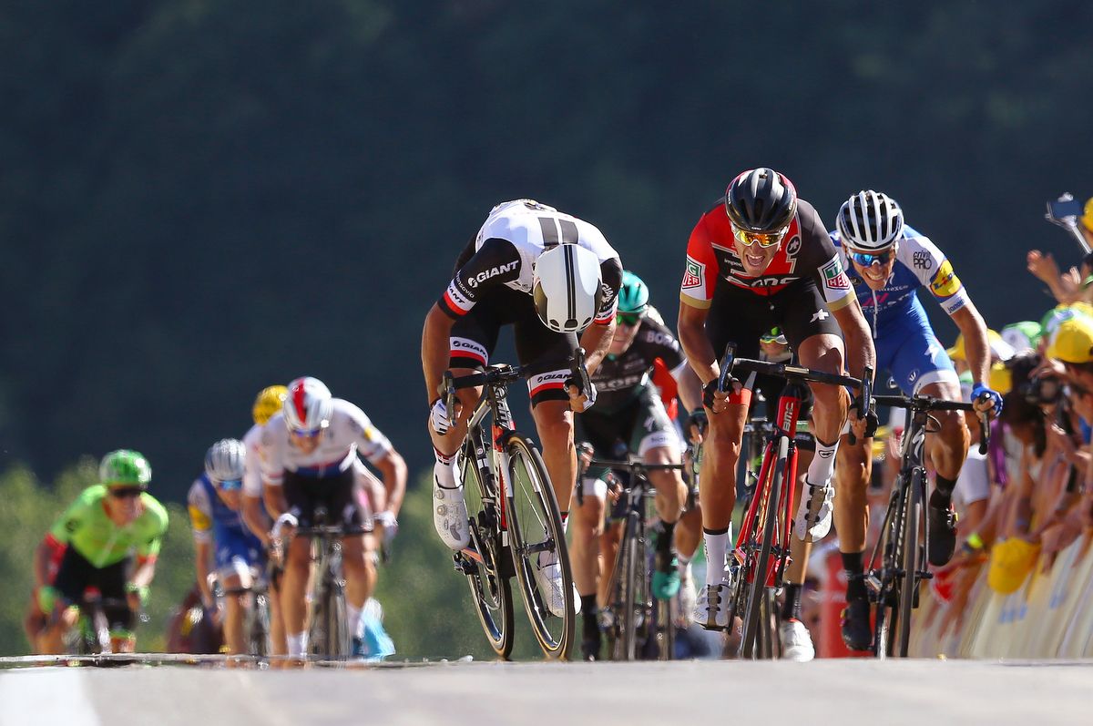 Greg Van Avermaet (BMC Racing) looks over to see Michael Matthews blast past