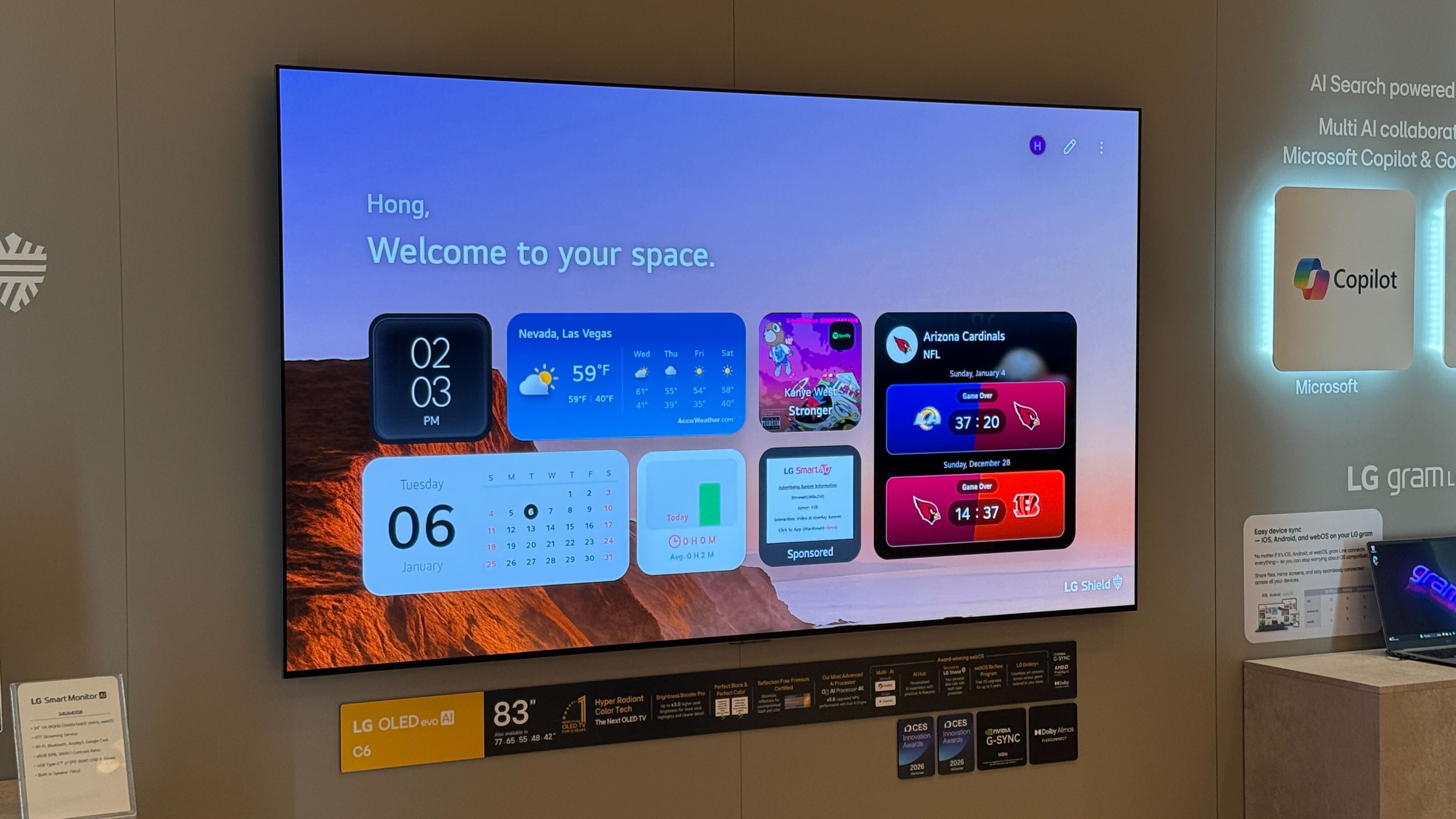 A wall-mounted LG C6 OLED TV at LG's CES 2026 booth