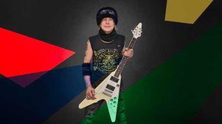 Michael Schenker posing with a Flying V