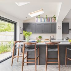 kitchen with bifold doors and skylights