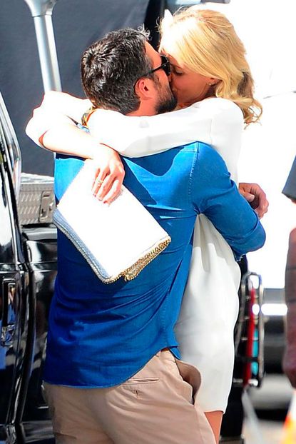 Cameron Diaz hugging Taylor Kinney on set