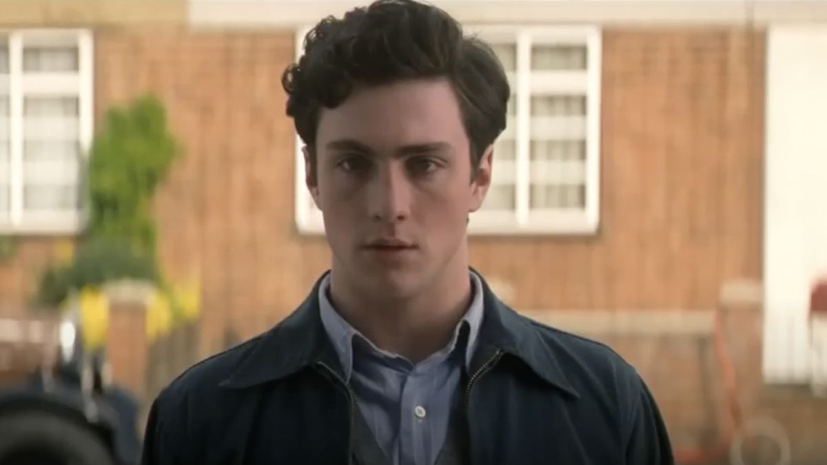 John Lennon (Aaron Taylor-Johnson) looks on in Nowhere Boy