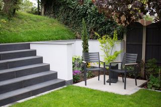 sloping garden ideas: with retaining walls and steps linking different areas