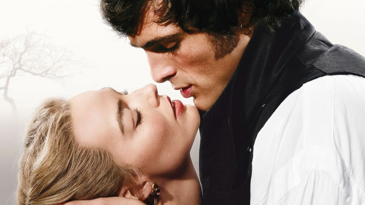 promotional image featuring a romantic close-up of two people in 19th-century attire leaning in for a kiss against a hazy, pale background.