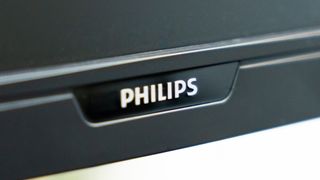 A black Philips 276B9H monitor sitting on a desk