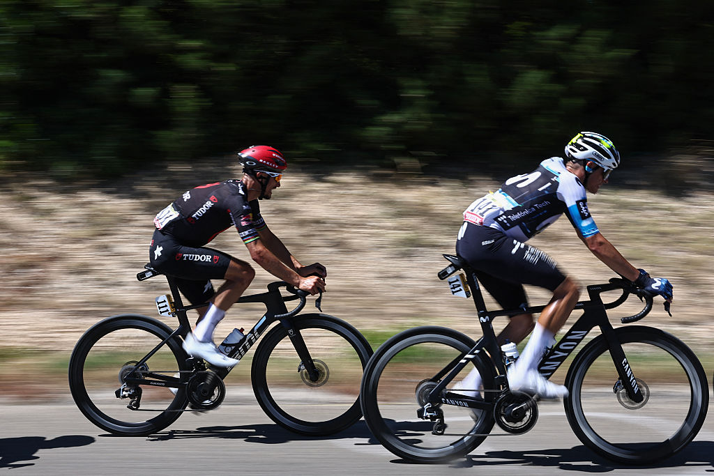 Tudor Pro Cycling Team's French rider Julian Alaphilippe and Movistar Team's Spanish rider Enric Mas cycle in a breakaway during the 16th stage of the 112th edition of the Tour de France cycling race, 171.5 km between Montpellier and Mont Ventoux, southern France, on July 22, 2025. (Photo by Anne-Christine POUJOULAT / AFP) (Photo by ANNE-CHRISTINE POUJOULAT/AFP via Getty Images)