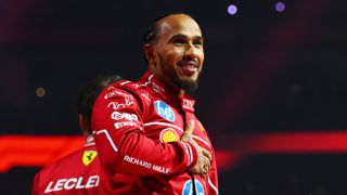 Lewis Hamilton of Great Britain and Scuderia Ferrari waves to the crowd from the stage during F1 75 Live in the run up to the 2025 F1 season