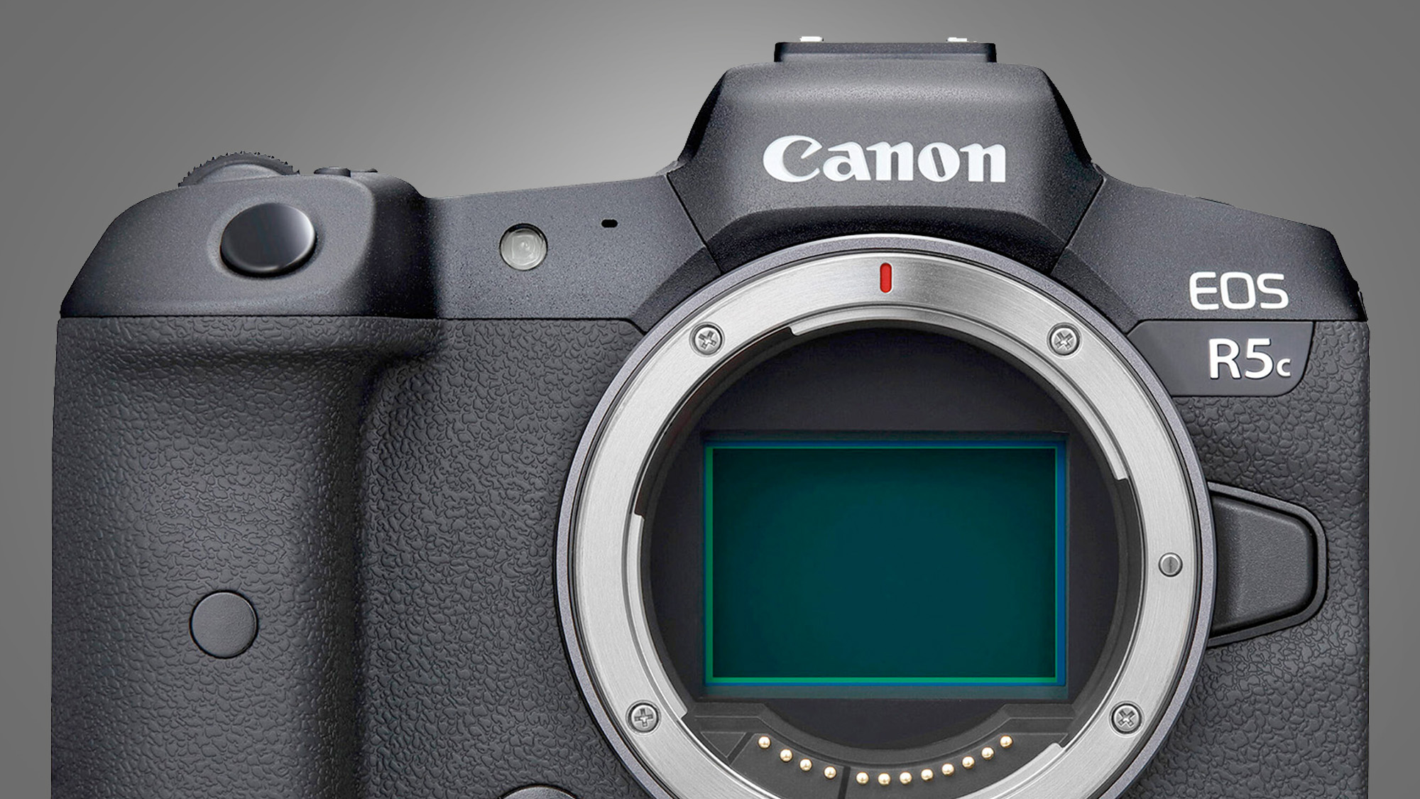 The Canon EOS R5 on a grey background