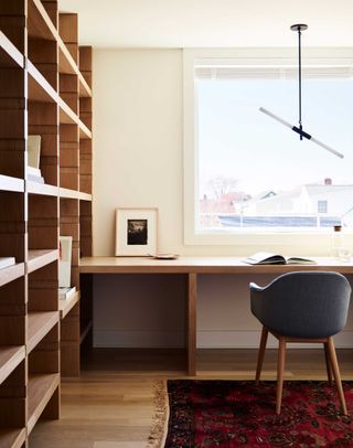 a home office with bespoke shelving