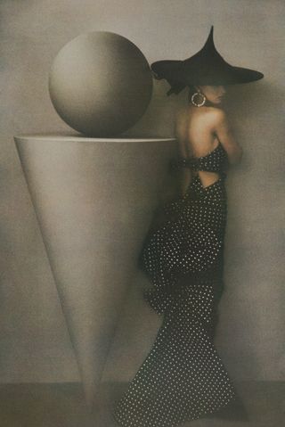 Sheila Metzner photograph of sculpture and model in dress