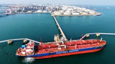 An oil tanker of Northsea Shipping loads off imported crude at an oil terminal in Qingdao in eastern China's Shandong province