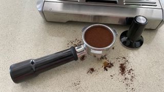 tamping the coffee