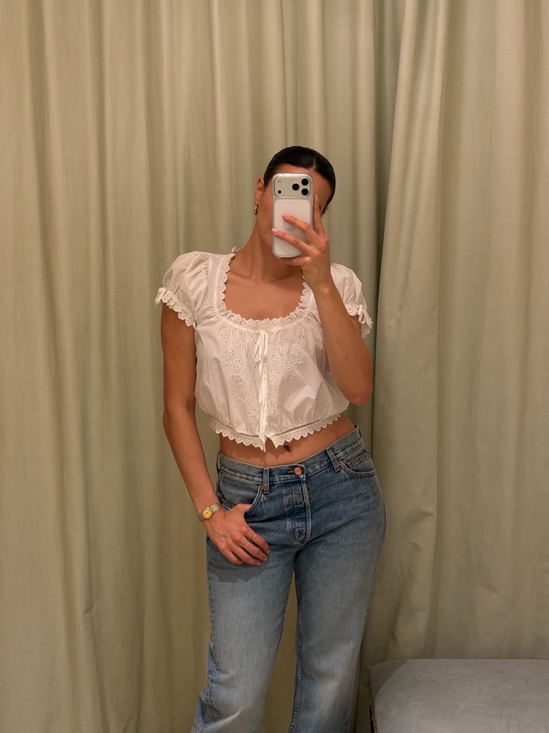 An image of @c.joanna wearing a peasant top from Doen.