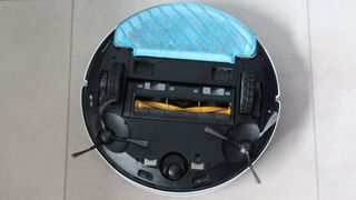 Ecovacs Deebot Ozmo N8+ upside down with the mopping pad attached