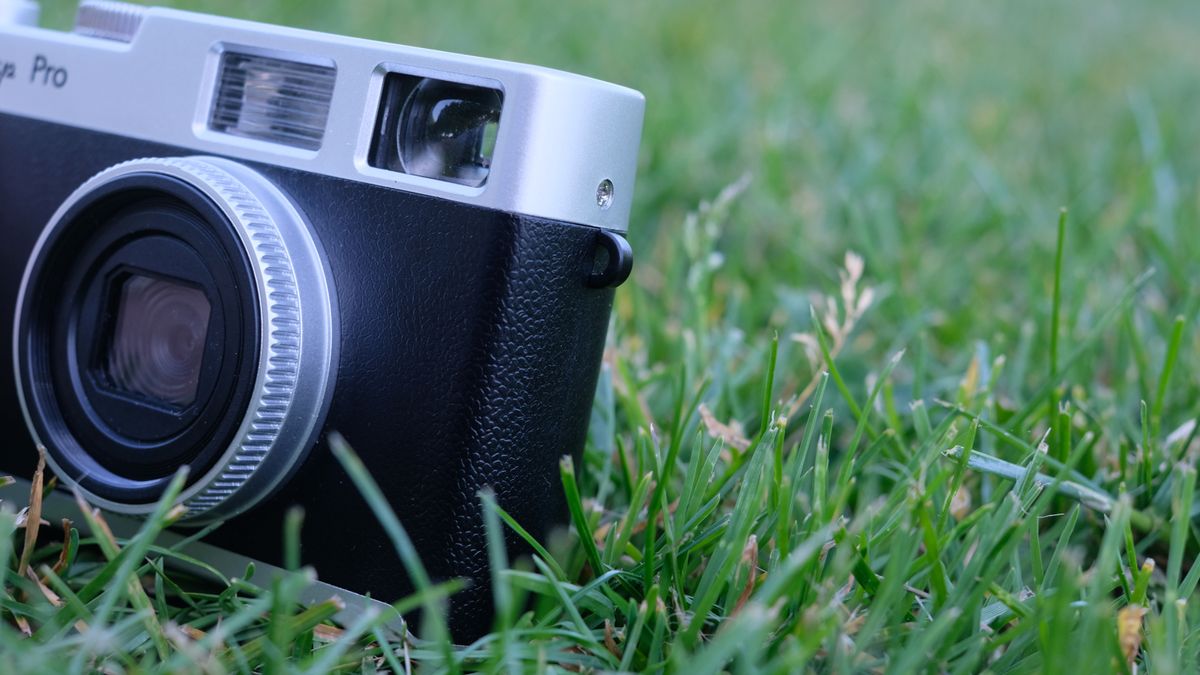 Photograph of Camp Snap CS-Pro digital compact camera with lug holes for strap showing