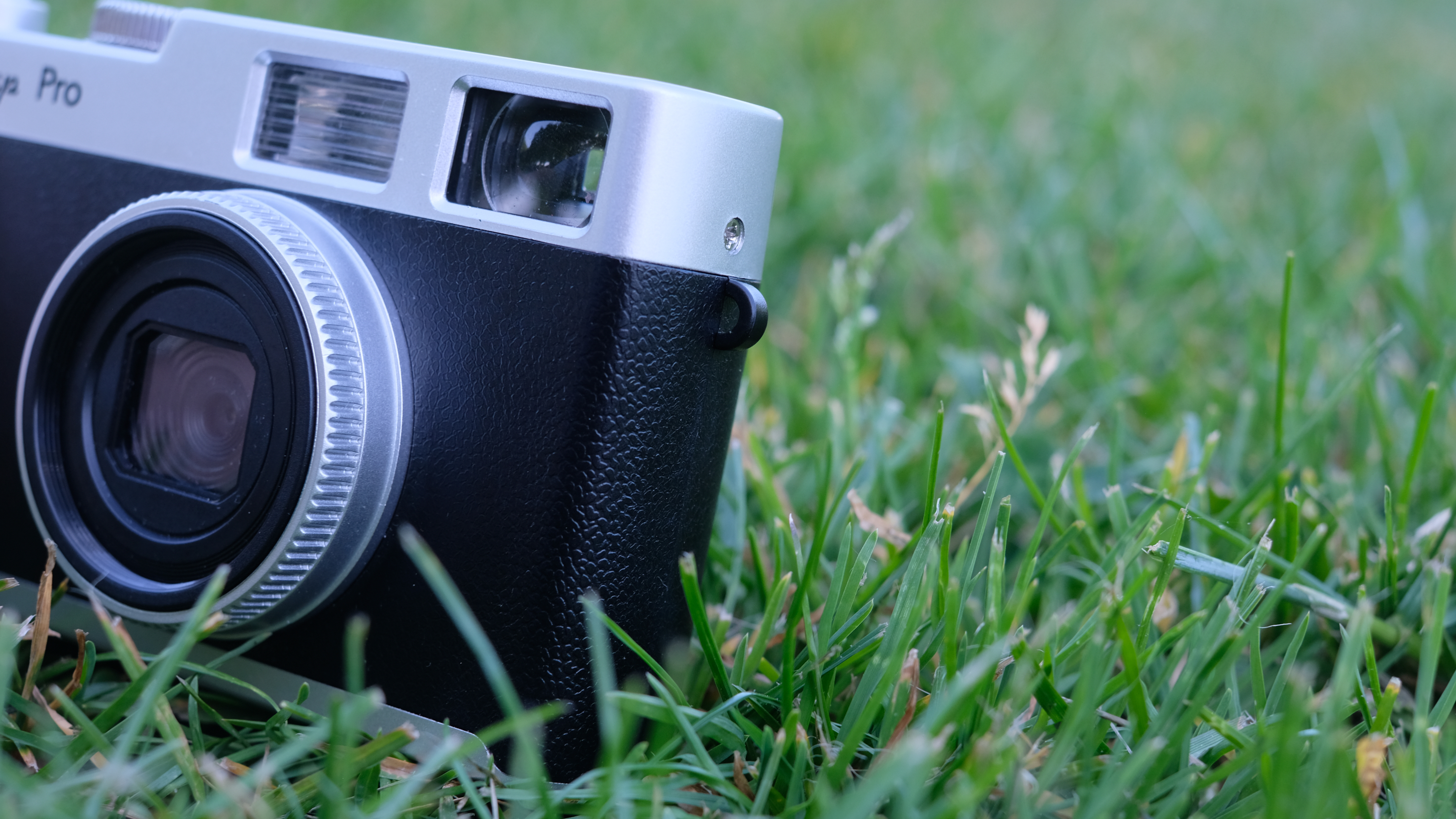 Photograph of Camp Snap CS-Pro digital compact camera with lug holes for strap showing
