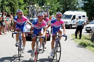 Damiano Cunego is escorted by his team-mates