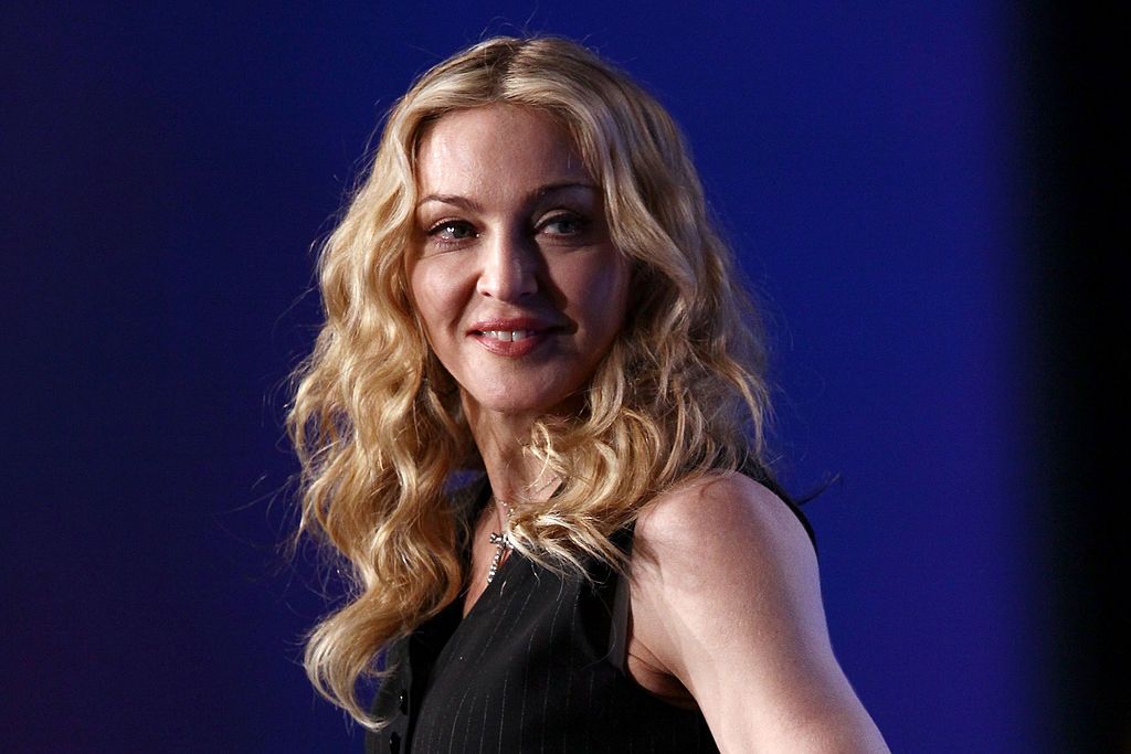 Singer Madonna looks on on during a press conference for the Bridgestone Super Bowl XLVI halftime show at the Super Bowl XLVI Media Center in the J.W. Marriott Indianapolis on February 2, 201