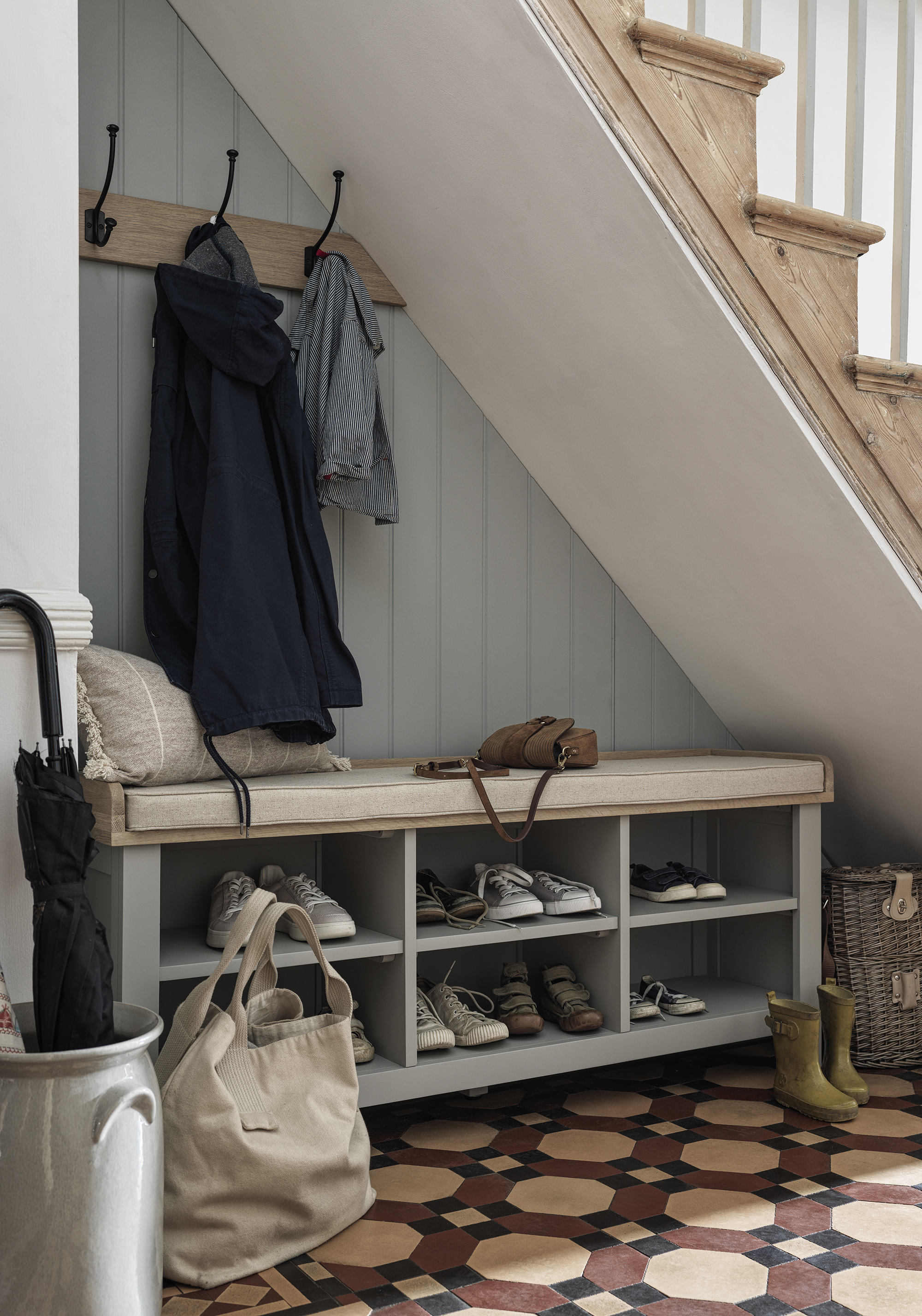 Cotswold Company Chester bench fitted under the stairs in a hallway