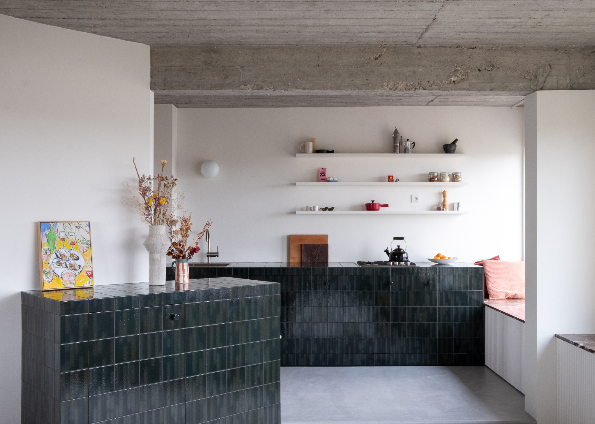 minimalist kitchen with open shelving a tiled island and cabinet