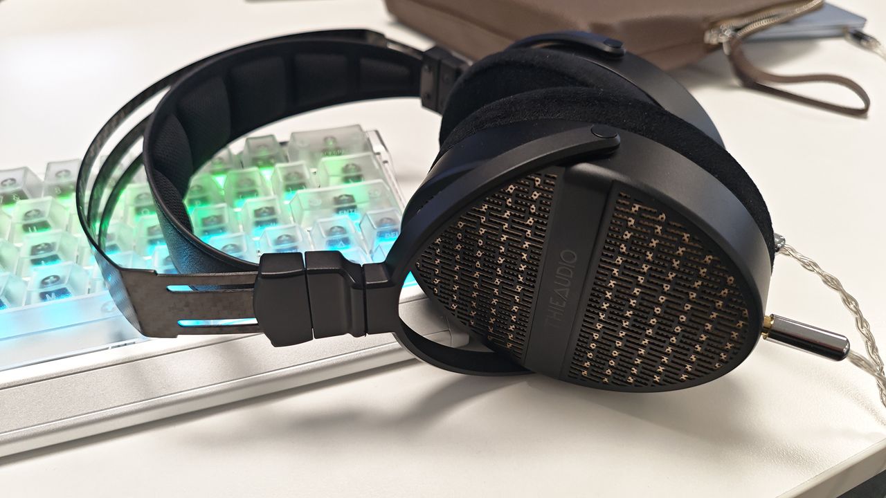 The Theiaudio Cypher headphone in a work office setting.