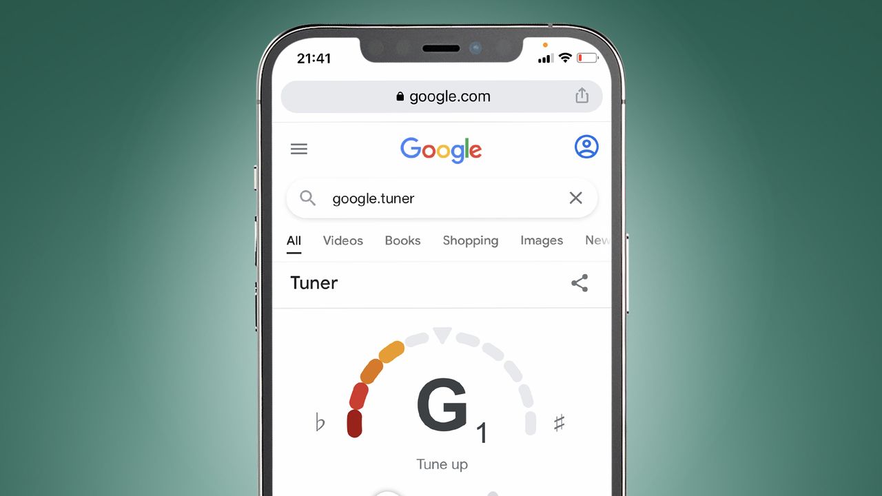 A smartphone on a green background showing the guitar tuner Easter egg
