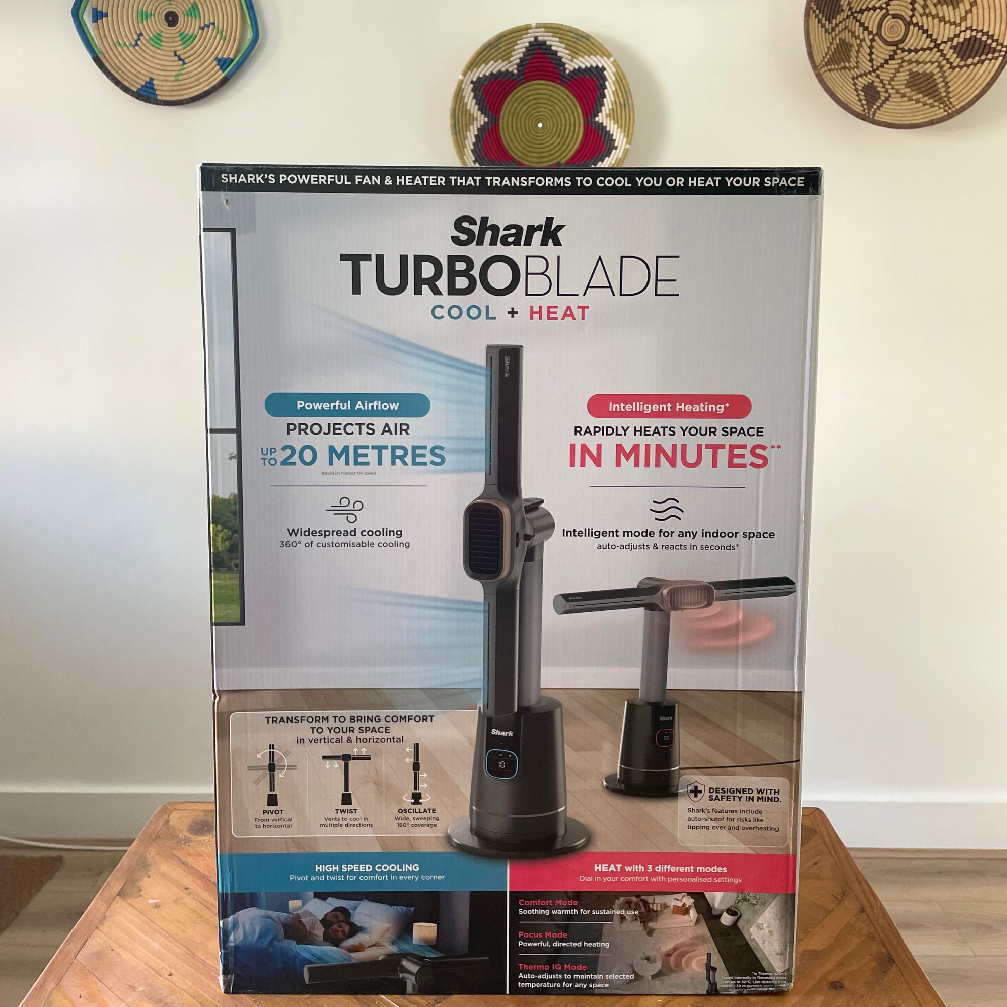 Shark TurboBlade Cool + Heat TH200UK box sitting on a wooden table in front of a white wall