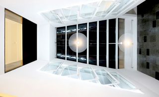 The interior of the white-rendered, concrete-based construction