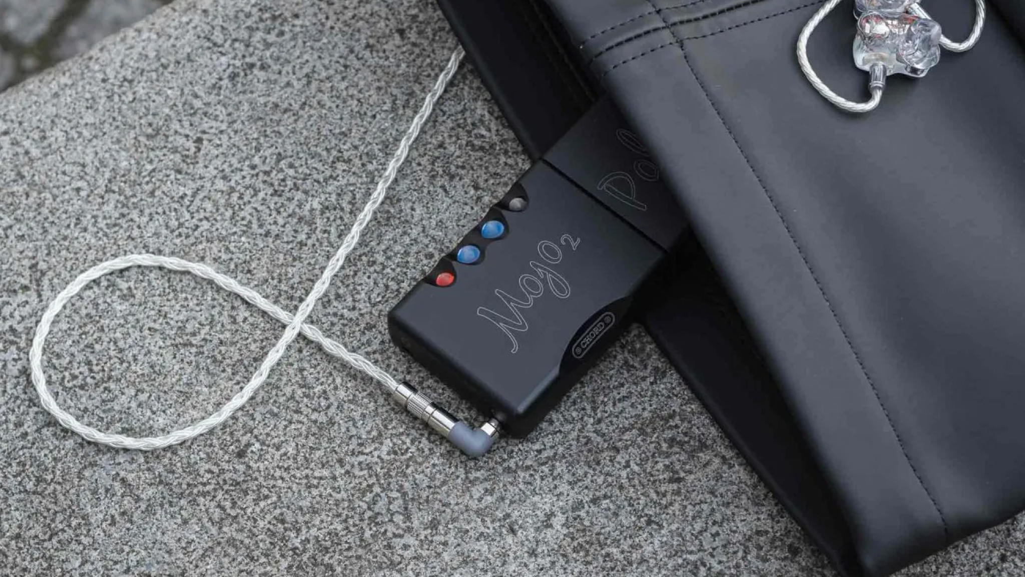 Chord Electronics Mojo 2 DAC with IEMs connected to it