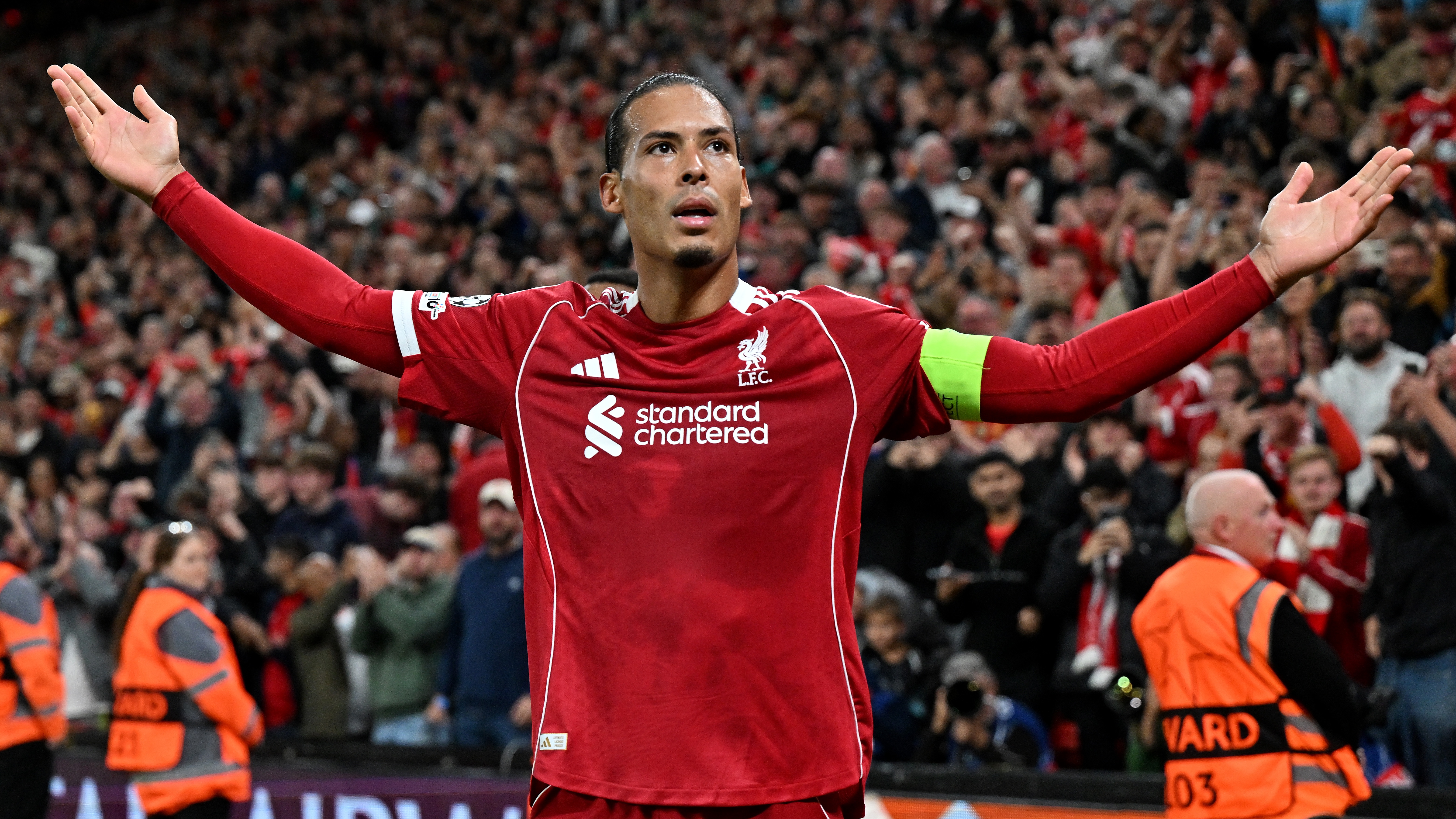 Virgil van Dijk of Liverpool celebrates scoring his team's third goal during the UEFA Champions League 2025/26 League Phase MD1 match between Liverpool FC and Atletico de Madrid at Anfield on September 17, 2025 in Liverpool, England.