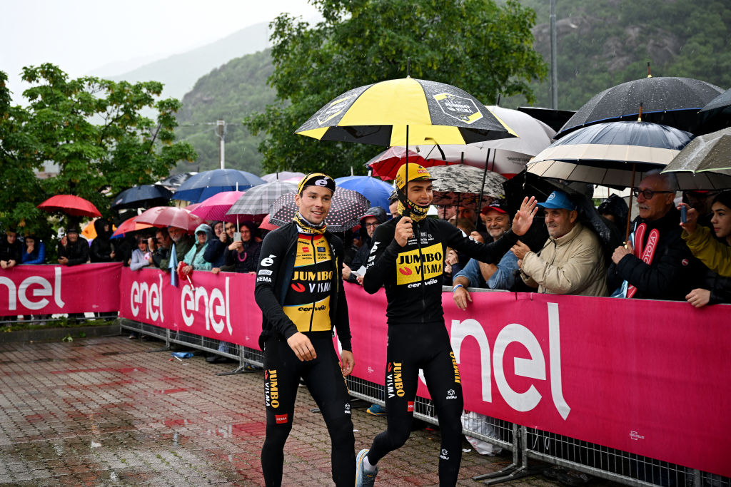 BORGOFRANCO DIVREA ITALY MAY 19 LR Primo Rogli of Slovenia and Sepp Kuss of The United States and Team JumboVisma prior to the 106th Giro dItalia 2023 Stage 13 a 199km stage from Borgofranco dIvrea to CransMontana Valais 1456m UCIWT on May 19 2023 in Borgofranco dIvrea Italy Photo by Stuart FranklinGetty Images