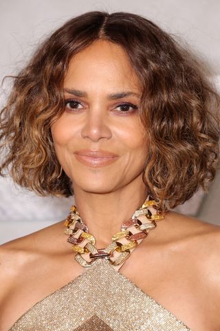 Halle Berry is pictured with a curly bob at the Lionsgate's "Never Let Go" World Premiere at Regal Times Square on September 16, 2024 in New York City.