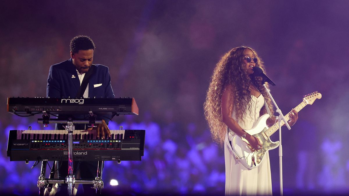 H.E.R. performs the USA national anthem during the closing ceremony of the 2024 Paris Olympics at Stade de France on Sunday, August 11, 2024