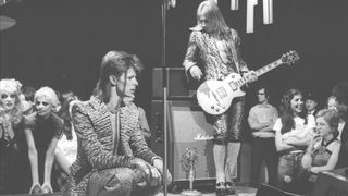 David Bowie (1947 - 2016) performs 'The Jean Genie' on BBC TV show 'Top Of The Pops', London, on 3rd January 1973. (L-R) David Bowie (1947 - 2016) (vocals), Mick Ronson (guitar). The performance was broadcast on 4th January 1973 before being lost, rediscovered and broadcast again in December 2011.