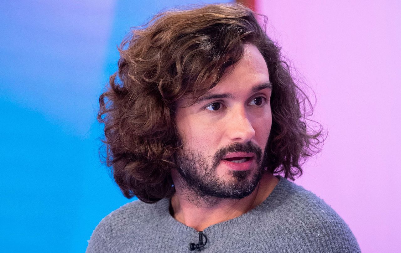 joe wicks controversial instagram photo balance baby daughter