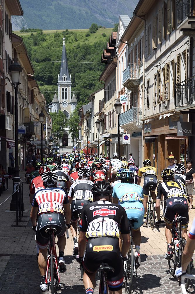 The pack rides during the 131.5 km first stage of the 67th edition of the Criterium Dauphine.
