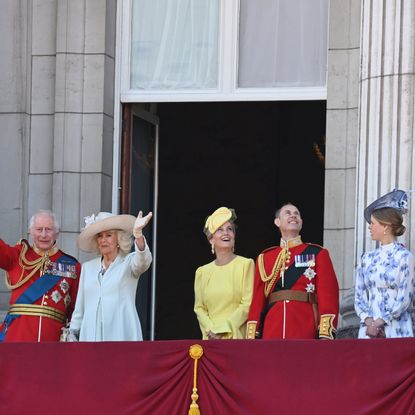 King Charles and Queen Camilla posing with members of the Royal Family on the Buckingham Palace balcony