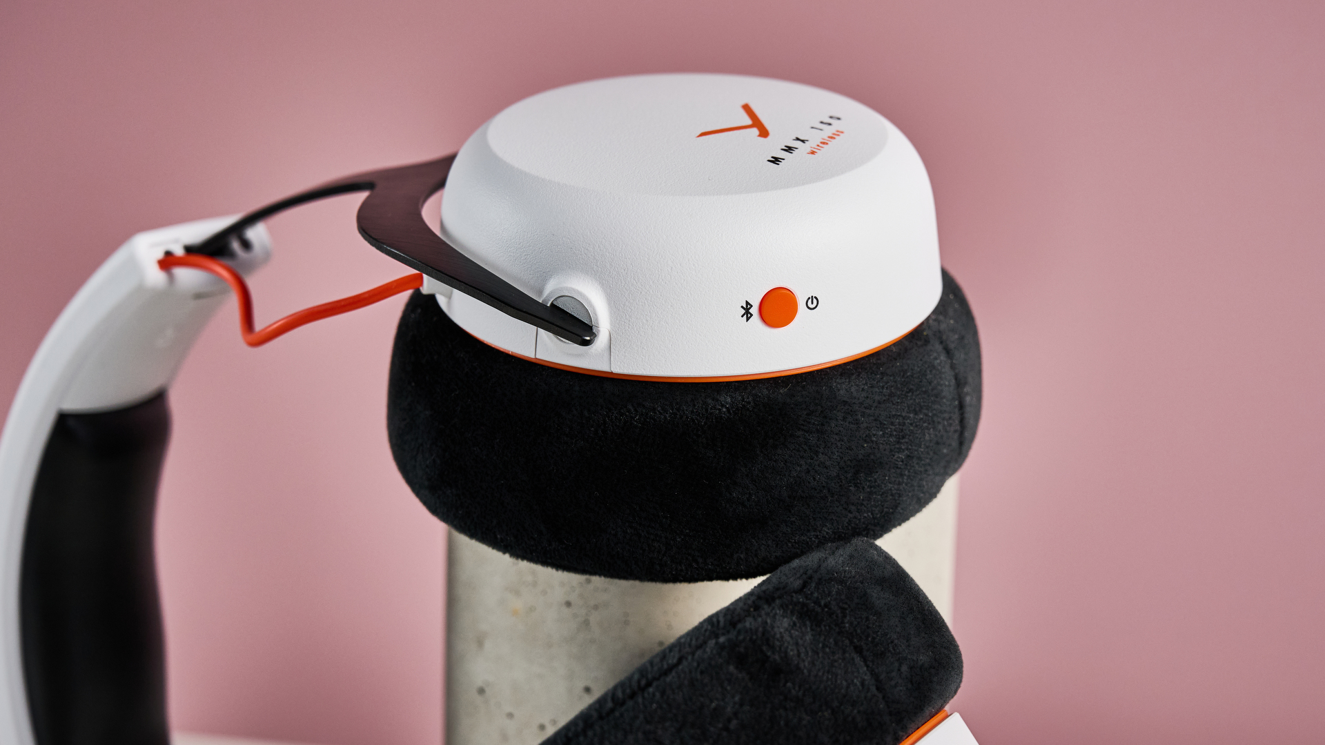 A closeup of the Bluetooth / power button on the Beyerdynamic MMX 150 Wireless.